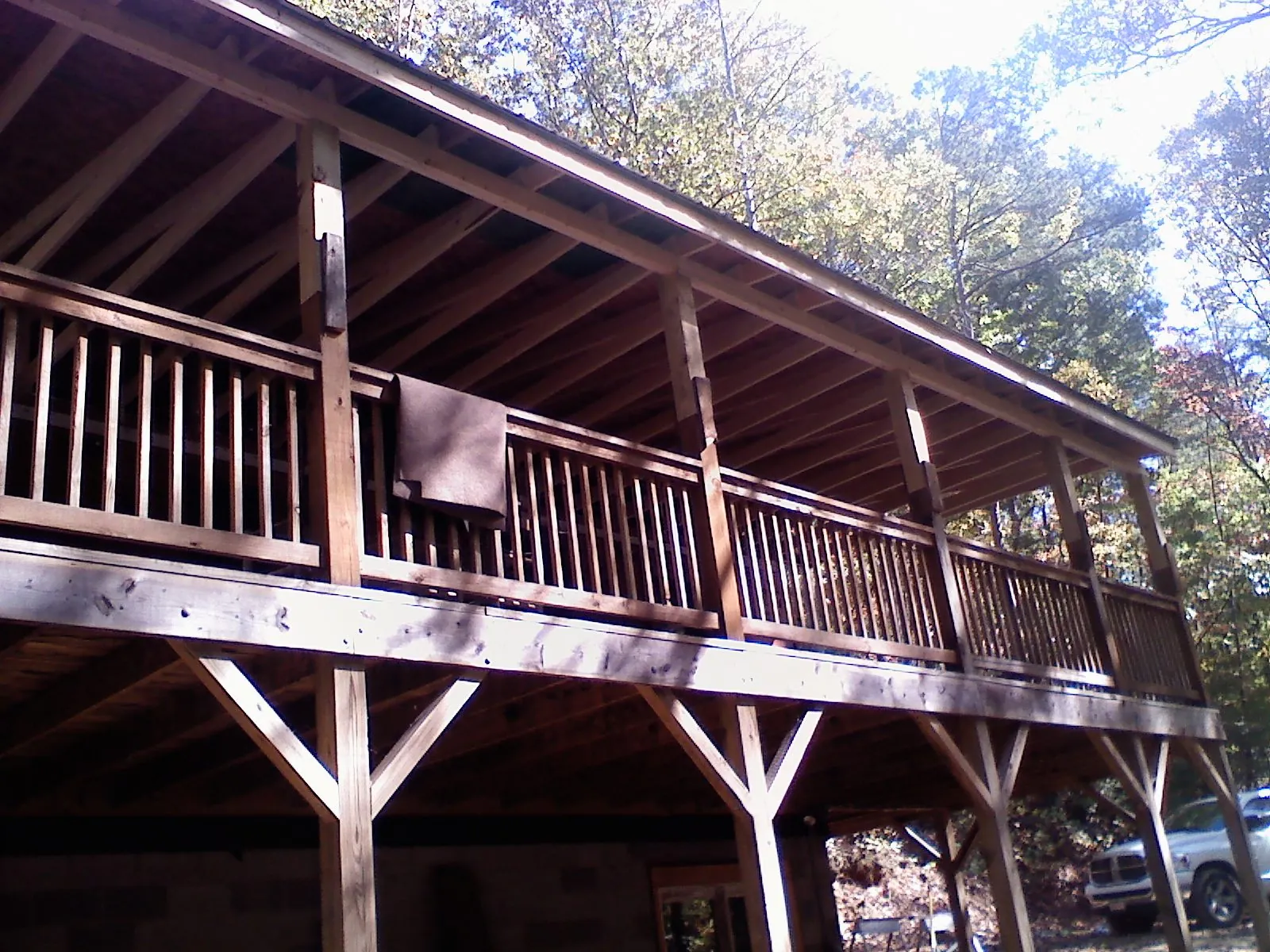 Timber framing under a new elevated porch and deck in Beverly Hills